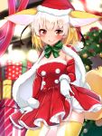  1girl alternate_costume animal_ears arm_at_side bangs black_hair blonde_hair blush bow bowtie cape christmas christmas_tree commentary detached_sleeves dress dress_lift extra_ears eyebrows eyebrows_visible_through_hair fennec_(kemono_friends) fox_ears fox_tail fur-trimmed_cape fur-trimmed_sleeves fur_trim gift gloves green_legwear hand_up hat highres kemono_friends kinou_no_shika lifted_by_self looking_at_viewer medium_hair multicolored_hair open_mouth pom_pom_(clothes) red_dress santa_costume santa_gloves santa_hat short_dress smile solo standing strapless strapless_dress tail thigh-highs upper_body white_gloves white_hair yellow_legwear zettai_ryouiki 
