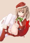  1girl bangs blush boots bow bowtie brown_eyes christmas eyebrows_visible_through_hair full_body fur_trim green_neckwear hair_between_eyes hair_bun hat highres kantai_collection leg_up light_brown_hair long_hair long_sleeves looking_at_viewer michishio_(kantai_collection) open_mouth panties pantyhose pantyhose_pull pillow pom_pom_(clothes) red_footwear sack santa_costume santa_hat simple_background solo sweatdrop underwear white_legwear white_panties yuki_(yukin0128) 