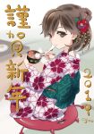  1girl 2019 ajino_(sakanahen) arashio_(kantai_collection) artist_logo blurry brown_eyes brown_hair cushion depth_of_field eating enemy_lifebuoy_(kantai_collection) floral_print from_behind full_body highres japanese_clothes kantai_collection kimono kotatsu long_hair mochi new_year pink_background print_kimono seiza sitting socks solo tabi table tied_hair white_legwear zouni_soup 