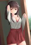  1girl akagi_(kantai_collection) arm_up bangs bare_shoulders blush breasts brown_eyes brown_hair cleavage eyebrows_visible_through_hair female hair_between_eyes hakama hakama_skirt half-closed_eyes hand_in_hair japanese_clothes kantai_collection large_breasts long_hair long_sleeves looking_at_viewer ne_an_ito no_bra open_clothes redhead skirt smile solo standing tasuki 