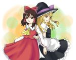  2girls bad_id bow hakurei_reimu hat kirisame_marisa touhou 