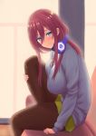  1girl bangs black_legwear blue_cardigan blue_eyes blush breasts brown_hair closed_mouth commentary_request couch go-toubun_no_hanayome green_skirt hair_between_eyes headphones headphones_around_neck large_breasts leg_up long_hair looking_at_viewer nakano_miku pantyhose pleated_skirt redhead shirt sitting skirt smile solo tile_floor tiles toyatokage white_shirt 