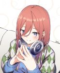  1girl absurdres bangs blue_eyes blue_sweater blush breasts closed_mouth commentary_request eyebrows_visible_through_hair fingernails fingers fingers_together go-toubun_no_hanayome hair_between_eyes headphones headphones_around_neck highres ky_(ky990533) long_hair long_sleeves looking_at_viewer nakano_miku redhead smile solo sweater upper_body 
