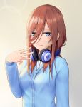  1girl bangs blue_eyes blue_sweater blush breasts closed_mouth commentary commentary_request fattybot fingernails go-toubun_no_hanayome hair_between_eyes headphones headphones_around_neck highres long_hair long_sleeves looking_at_viewer medium_breasts nakano_miku partial_commentary shiny shiny_hair shirt simple_background smile solo sweater upper_body white_shirt 
