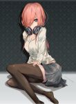  1girl bangs black_legwear blue_eyes breasts cleavage closed_mouth commentary_request fingernails full_body go-toubun_no_hanayome grey_skirt hair_over_one_eye headphones headphones_around_neck long_hair looking_at_viewer medium_breasts nakano_miku pink_hair renze_l shirt sitting skirt solo thigh-highs white_shirt 