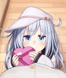  1boy 1girl admiral_(kantai_collection) ahoge bangs black_sailor_collar blurry blush box commentary covered_mouth depth_of_field eyebrows_visible_through_hair eyes_visible_through_hair flat_cap from_above gift gift_box hammer_and_sickle hat heart-shaped_box heart_ahoge hibiki_(kantai_collection) highres holding holding_box holding_gift jewelry kantai_collection long_hair looking_at_viewer looking_up pavement pov reitou_mikan ring sailor_collar school_uniform serafuku sideways_hat silver_hair sleeves_past_wrists solo_focus star valentine verniy_(kantai_collection) wedding_band white_hat 