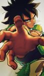  1boy armor black_eyes black_hair blurry broly_(dragon_ball_super) depth_of_field dragon_ball dragon_ball_super_broly expressionless fingernails frown grey_background highres looking_at_viewer male_focus outstretched_hand serious simple_background spiky_hair standing tama_azusa_hatsu twitter_username 