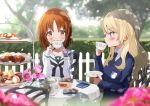  2girls alternate_hairstyle bangs black_neckwear blonde_hair blouse blue_eyes blue_sweater blurry blurry_background blurry_foreground blush brown_eyes brown_hair chair cookie cup dappled_sunlight darjeeling day depth_of_field dress_shirt drinking emblem eyebrows_visible_through_hair flower food fuku_kitsune_(fuku_fox) girls_und_panzer hair_down hedge_(plant) holding holding_cup holding_saucer long_hair long_sleeves macaron multiple_girls neckerchief necktie nishizumi_miho ooarai_school_uniform outdoors pink_flower pink_rose rose saucer school_uniform serafuku shadow shirt short_hair sitting st._gloriana&#039;s_(emblem) sunlight sweater tea_party tea_set teacup teapot tiered_tray tree v-neck white_blouse white_shirt wind 