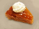  bcd brown_background dessert food food_focus highres no_humans original realistic still_life tart_(food) whipped_cream 