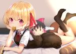  1girl bangs bed black_hair black_legwear black_skirt black_vest blonde_hair blurry blurry_background blush blush_stickers boned_meat bow bread chin_rest commentary_request eyebrows_visible_through_hair food hair_bow hair_ribbon hair_tubes hakurei_reimu hand_up highres indoors kneehighs legs_up looking_at_viewer lying meat miniskirt mouth_hold neck_ribbon no_shoes on_stomach pleated_skirt red_bow red_eyes red_neckwear red_ribbon ribbon rumia shadow shirt short_hair short_sleeves skirt skirt_set solo thighs touhou vest white_shirt wing_collar wowoguni 