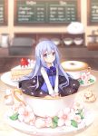  1girl absurdres black_skirt blue_eyes blue_hair blue_vest blurry blurry_background cake cup depth_of_field flower food fruit gochuumon_wa_usagi_desu_ka? hair_ornament hairclip hands_on_own_thighs highres kafuu_chino kiku_(ks5832) long_hair minigirl rabbit shirt sitting skirt smile solo strawberry tea teacup vest white_shirt 