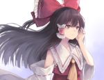  1girl :/ ascot blurry bow brown_hair depth_of_field detached_sleeves hair_bow hair_tubes hakurei_reimu highres kizitora_hato large_bow long_hair looking_to_the_side red_bow ribbon-trimmed_sleeves ribbon_trim touhou 