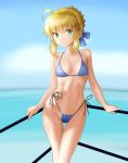  1girl against_railing ahoge artoria_pendragon_(all) bangs bare_arms bare_shoulders bikini blonde_hair blue_bikini blue_bow blue_sky blurry blurry_background blush bow braid breasts closed_mouth clouds commentary_request day depth_of_field eyebrows_visible_through_hair fate/stay_night fate_(series) green_eyes groin hair_between_eyes hair_bow highleg highleg_bikini highres horizon looking_at_viewer navel ocean outdoors railing saber side-tie_bikini sidelocks sky small_breasts smile solo standing swimsuit taka_(takahirokun) water 