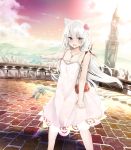  1girl absurdres animal_ears azur_lane bag bell blue_eyes blurry blush bow breasts brick_road cat_ears cat_tail city cityscape cleavage clenched_hand clouds collarbone commentary_request depth_of_field dress eyebrows_visible_through_hair eyelashes fang flower furrowed_eyebrows hair_between_eyes hair_bow hair_flower hair_ornament hammann_(azur_lane) handbag highres jewelry long_hair looking_at_viewer medium_breasts necklace open_mouth pendant pointing railing river rurekuchie sky solo spaghetti_strap sunset tail tail_bell tail_ornament tears tower tsurime very_long_hair white_hair wind 