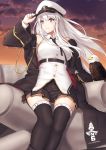  1girl azur_lane bald_eagle belt bird black_belt black_coat black_neckwear breasts clouds cloudy_sky coat collared_shirt commentary concrete eagle enchuu enterprise_(azur_lane) eyebrows_visible_through_hair feet_out_of_frame hat highres large_breasts long_hair military military_hat miniskirt necktie open_clothes open_coat orange_sky peaked_cap shirt shore silver_hair skirt sky sleeveless sleeveless_shirt solo tetrapod thigh-highs underbust violet_eyes wall white_headwear 