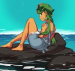  1girl barefoot commission creatures_(company) dark_skin flower from_behind full_body game_freak green_eyes green_hair hair_flower hair_ornament headband highres light_smile lips long_hair looking_back low_twintails lying mallow_(pokemon) nintendo ocean overall_shorts pokemon pokemon_(anime) pokemon_(game) pokemon_sm pokemon_sm_(anime) polyle pose rock solo strapless trial_captain tubetop twintails 