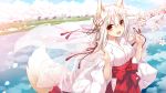  1girl :d animal_ear_fluff animal_ears bangs bell blue_sky blush breasts commentary_request day eyebrows_visible_through_hair fang flower fox_ears fox_girl fox_tail hair_bell hair_between_eyes hair_ornament hair_ribbon hakama highres holding japanese_clothes jingle_bell kimono looking_at_viewer miko open_mouth original outdoors petals red_eyes red_hakama red_ribbon reflection ribbon river saeki_touma see-through sky small_breasts smile solo tail tree tree_branch water white_flower white_hair white_kimono 