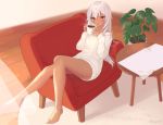  1girl aran_sweater armchair bangs bare_legs barefoot blush chair coffee coffee_mug cup curtains dark_skin eyebrows_visible_through_hair full_body highres holding holding_cup indoors komiya_nigi legs long_hair long_sleeves lying mug on_back original plant potted_plant red_eyes rug silver_hair solo sweater table tsurime white_sweater wind wooden_floor 