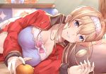  1girl ahoge basket blonde_hair blue_eyes blush breasts cleavage collarbone commentary_request food fruit granblue_fantasy grin haido_(ryuuno_kanzume) hair_intakes hairband jeanne_d&#039;arc_(granblue_fantasy) kotatsu long_hair looking_at_viewer lying mandarin_orange navel on_side pajamas pillow smile solo stuffed_toy table track_suit 