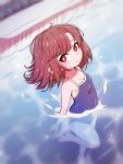  1girl blurry breasts cleavage depth_of_field foreshortening from_above full_body highres in_water kitanaga knee_up legs looking_at_viewer medium_hair pool red_eyes redhead school_uniform smile solo thighs ueno-san_wa_bukiyou yufutwun 