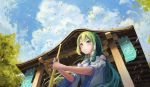  1girl architecture bamboo_broom bangs blue_sky blush broom clouds day detached_sleeves dutch_angle east_asian_architecture falling_leaves fjsmu from_below green_eyes green_hair hair_ornament hair_tubes highres holding holding_broom kochiya_sanae leaf light_smile long_hair looking_away moriya_shrine outdoors outstretched_arms parted_bangs rope shimenawa shrine single_sidelock sky snake_hair_ornament solo touhou tree upper_body very_long_hair vest white_vest 