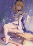  1girl :o ahoge alternate_costume artist_name artoria_pendragon_(all) bangs bare_shoulders blonde_hair blue_ribbon blush breasts choker dress fate/grand_order fate/stay_night fate_(series) green_eyes hair_between_eyes hair_ribbon halter_dress head_tilt high_heels highres holding_shoe long_hair looking_at_viewer medium_breasts mool_yueguang open_mouth petals plant potted_plant ribbon saber shoe_removed sidelocks sitting solo thigh-highs white_dress white_footwear white_legwear yokozuwari 