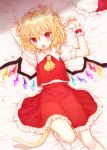  1girl :o animal_ear_fluff animal_ears arms_up ascot bangs bed_sheet blonde_hair blush cat_ears cat_tail commentary_request crystal eyebrows_visible_through_hair feet_out_of_frame flandre_scarlet frilled_shirt_collar frills from_above hair_between_eyes hat hat_removed hat_ribbon headwear_removed honotai kemonomimi_mode looking_at_viewer lying mob_cap on_back open_mouth petticoat puffy_short_sleeves puffy_sleeves red_eyes red_ribbon red_skirt red_vest ribbon shirt short_hair short_sleeves skirt socks solo tail touhou vest white_headwear white_legwear white_shirt wings wrist_cuffs yellow_neckwear 