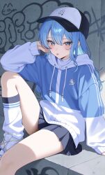  1girl :p absurdres asymmetrical_sidelocks black_skirt blue_eyes blue_hair blue_jacket colored_inner_hair double-parted_bangs drawstring elbow_on_knee expressionless hair_between_eyes hand_up hashtag-only_commentary hat highres hololive hoshimachi_suisei hoshimachi_suisei_(11th_costume) jacket knee_up leg_warmers long_hair looking_at_viewer miniskirt mui_maru multicolored_hair multicolored_jacket official_alternate_costume pleated_skirt sitting skirt sleeves_past_wrists solo star_(symbol) star_in_eye symbol_in_eye tongue tongue_out two-tone_hat two-tone_jacket virtual_youtuber white_jacket white_leg_warmers white_sneakers 