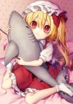  1girl :t bangs bed blonde_hair bobby_socks bow commentary_request crystal dress eyebrows_visible_through_hair flandre_scarlet full_body hair_between_eyes hat hat_bow highres holding holding_stuffed_animal indoors kyouda_suzuka long_hair looking_at_viewer mob_cap no_shoes one_side_up petticoat puffy_short_sleeves puffy_sleeves red_bow red_dress red_eyes shirt short_sleeves sitting socks solo stuffed_animal stuffed_shark stuffed_toy touhou wariza white_headwear white_legwear white_shirt wings 