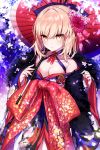  1girl alternate_costume artoria_pendragon_(all) bangs bare_shoulders blonde_hair bow breasts cleavage collarbone commentary eyebrows_visible_through_hair fate_(series) flower frown fur hair_flower hair_ornament highres kamiowl large_breasts long_hair long_sleeves looking_at_viewer saber_alter solo umbrella wide_sleeves yellow_eyes 