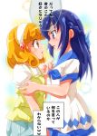  2girls arm_grab blonde_hair blue_hair blush commentary dokidoki!_precure eye_contact hishikawa_rikka holding_hands kanemoto_hisako kise_yayoi kotobuki_minako looking_at_another multiple_girls parody precure seiyuu_connection shishinon smile_precure! translated yagate_kimi_ni_naru yuri 