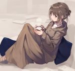  1girl blue_pillow brown_eyes brown_hair brown_skirt brown_sweater commentary_request cup from_above full_body hair_bun holding holding_cup hood hooded_sweater long_skirt nagishiro_mito original shirt sitting skirt solo striped striped_legwear sweater turtleneck 