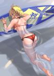  1girl ass ayakumo bare_shoulders barefoot bikini blonde_hair blush braid breasts commentary_request day eyebrows_visible_through_hair fate/grand_order fate_(series) green_eyes hair_ornament highres long_hair looking_at_viewer mordred_(fate)_(all) mordred_(swimsuit_rider)_(fate) open_mouth partially_submerged ponytail prydwen red_bikini scrunchie shoulder_blades side-tie_bikini solo surfboard swimsuit toned wristband 