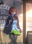  1girl absurdres bag bangs black_legwear blue_cardigan blue_eyes brown_hair cardigan coffee coffee_cup cup disposable_cup go-toubun_no_hanayome green_skirt hair_between_eyes headphones headphones_around_neck highres long_hair long_sleeves nakano_miku outdoors pantyhose pleated_skirt school_bag skirt storefront takenoko_27074918 