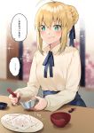  1girl ahoge artoria_pendragon_(all) blonde_hair blouse blue_ribbon blue_skirt bowl carnival_phantasm chopsticks commentary emiya-san_chi_no_kyou_no_gohan fate/stay_night fate_(series) food food_on_face green_eyes hair_bun hair_ribbon highres holding holding_bowl holding_chopsticks itohana long_sleeves plate ribbon rice_bowl saber skirt solo speech_bubble table translated type-moon upper_body white_blouse 