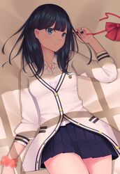  1girl bed_sheet black_hair black_nails black_skirt blue_eyes bow bowtie_removed collared_shirt cowboy_shot dress_shirt frown highres long_hair long_sleeves lying miniskirt nail_polish nestea on_back orange_scrunchie pleated_skirt red_bow red_neckwear school_uniform scrunchie shadow shiny shiny_hair shirt skirt solo ssss.gridman takarada_rikka white_cardigan white_shirt wing_collar wrist_scrunchie 