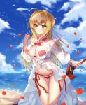  1girl aestus_estus ahoge bangs bare_shoulders beach bikini blonde_hair blue_sky blush braid breasts closed_mouth criss-cross_halter dress fate/grand_order fate_(series) french_braid gown green_eyes hair_between_eyes hair_intakes halterneck highres large_breasts lkeris long_hair looking_at_viewer navel nero_claudius_(fate)_(all) nero_claudius_(swimsuit_caster)_(fate) ocean petals rose_petals side-tie_bikini sky smile solo sparkle striped striped_bikini swimsuit sword thighs weapon 