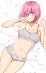  1girl bed_sheet boyshorts bra breasts cherry_blossoms closed_mouth collarbone eyebrows_visible_through_hair eyes_visible_through_hair fate/grand_order fate_(series) flower from_above glasses hair_over_one_eye highres lying mash_kyrielight medium_breasts on_bed petals pink_hair sheet_grab short_hair smile sports_bra thighs uiri-na underwear underwear_only violet_eyes 