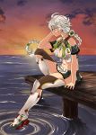  1girl amato_jp asymmetrical_hair braid cloud_print clouds cloudy_sky dock dusk hair_ornament horizon jitome kantai_collection long_hair midriff ocean outdoors pier scenery silver_hair single_braid skirt sky solo sun sunlight sunset thigh-highs thighs unryuu_(kantai_collection) very_long_hair water yellow_eyes 