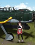  1girl aircraft_request akagi_(kantai_collection) annin_musou apron black_hair black_legwear blue_sky brown_eyes clouds day flight_deck full_body geta grass hakama_skirt highres japanese_clothes kantai_collection long_hair looking_to_the_side muneate outdoors red_skirt remodel_(kantai_collection) skirt sky solo standing straight_hair thigh-highs 