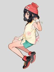  1girl beanie black_hair blush closed_mouth floral_print fua1heyvot4ifsr green_eyes green_shorts grey_background hat highres pokemon pokemon_sm red_hat selene_(pokemon) shirt short_hair short_sleeves shorts simple_background sweat sweatdrop t-shirt tied_shirt yellow_shirt z-ring 