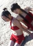  2girls avatar:_the_last_airbender azula beach cosplay long_hair mai_(avatar) multiple_girls photo sand sitting 
