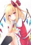  1girl ascot bangs black_legwear blonde_hair blush bow center_frills commentary crystal eyebrows_visible_through_hair feet_out_of_frame flandre_scarlet frilled_shirt_collar frills hair_bow hand_up head_rest kneehighs knees_up long_hair looking_at_viewer miniskirt no_hat no_headwear one_side_up petticoat puffy_short_sleeves puffy_sleeves red_bow red_eyes red_skirt red_vest renka_(cloudsaikou) shirt short_sleeves simple_background sitting skirt skirt_set smile solo touhou vest white_background white_shirt wings yellow_neckwear 