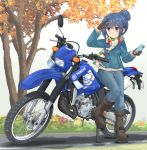  1girl autumn_leaves bangs black_gloves blue_hair blue_jacket blue_pants boots brown_footwear cellphone commentary_request denim denim_jacket eyebrows_visible_through_hair gloves ground_vehicle hair_bun highres holding holding_cellphone holding_phone jacket jeans logo looking_to_the_side mikeran_(mikelan) motor_vehicle motorcycle multicolored multicolored_clothes multicolored_scarf pants partial_commentary phone scarf shading_eyes shima_rin smartphone solo standing standing_on_one_leg striped striped_scarf tree violet_eyes white_background yamaha yurucamp 