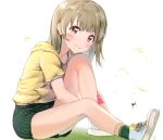  1girl bangs blue_footwear blush brown_hair closed_mouth commentary_request drawstring eyebrows_visible_through_hair green_legwear green_shorts hair_ornament highres hood hood_down hoodie knee_up looking_at_viewer love_live! love_live!_school_idol_festival nakasu_kasumi on_grass red_eyes shaka_(staito0515) shoes short_shorts short_sleeves shorts sitting smile socks solo striped sweat vertical-striped_shorts vertical_stripes white_background yellow_hoodie 