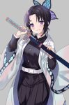  1girl bangs belt belt_buckle black_hair black_jacket black_pants blush breasts buckle butterfly_hair_ornament closed_mouth commentary english_commentary eyebrows_visible_through_hair forehead gradient_hair grey_background hair_ornament hands_up highres hitsukuya holding holding_sheath holding_sword holding_weapon jacket katana kimetsu_no_yaiba kochou_shinobu long_sleeves looking_at_viewer multicolored_hair open_clothes pants parted_bangs purple_hair sheath small_breasts smile solo sword unsheathing violet_eyes weapon white_belt wide_sleeves 