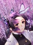  1girl black_jacket bug butterfly butterfly_hair_ornament floating_hair flower gradient_hair hair_ornament haori highres hisuririi insect jacket japanese_clothes kimetsu_no_yaiba kochou_shinobu looking_at_viewer multicolored_hair parted_lips purple_flower purple_hair short_hair solo upper_body violet_eyes wisteria 