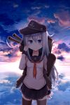 1girl absurdres anchor anchor_symbol baseball_cap black_headwear black_sailor_collar black_skirt blue_eyes blue_sky blush brown_legwear closed_mouth clouds cloudy_sky commentary_request hamayuu_(litore) hat hibiki_(kantai_collection) highres kantai_collection long_sleeves looking_at_viewer machinery ocean outdoors pleated_skirt red_neckwear reflection sailor_collar school_uniform serafuku shirt silver_hair skindentation skirt sky sleeves_past_wrists smile solo sunset thigh-highs twitter_username water white_shirt 