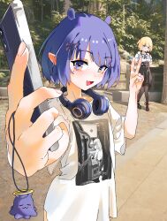  2girls black_shoes black_skirt blonde_hair blue_eyes bob_cut brown_pantyhose cellphone fang fence forest gurumie hair_ornament headphones headphones_around_neck high-waist_skirt highres holding holding_phone hololive hololive_english looking_at_viewer mole mole_under_eye multiple_girls nature ninomae_ina&#039;nis ninomae_ina&#039;nis_(loungewear) official_alternate_costume official_alternate_hair_length official_alternate_hairstyle open_mouth outdoors pantyhose phone pointy_ears print_shirt purple_hair shirt shoes short_hair short_sleeves skin_fang skirt smartphone strappy_heels t-shirt taking_picture takodachi_(ninomae_ina&#039;nis) v virtual_youtuber watson_amelia watson_amelia_(street_casual) white_shirt wooden_fence 