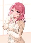 1girl arm_across_chest asato_(fadeless) bang_dream! bangs brown_sweater closed_mouth commentary_request eyebrows_visible_through_hair hand_on_own_face highres long_hair long_sleeves looking_at_viewer maruyama_aya pink_eyes pink_hair sleeves_past_wrists smile solo sweater swept_bangs upper_body 